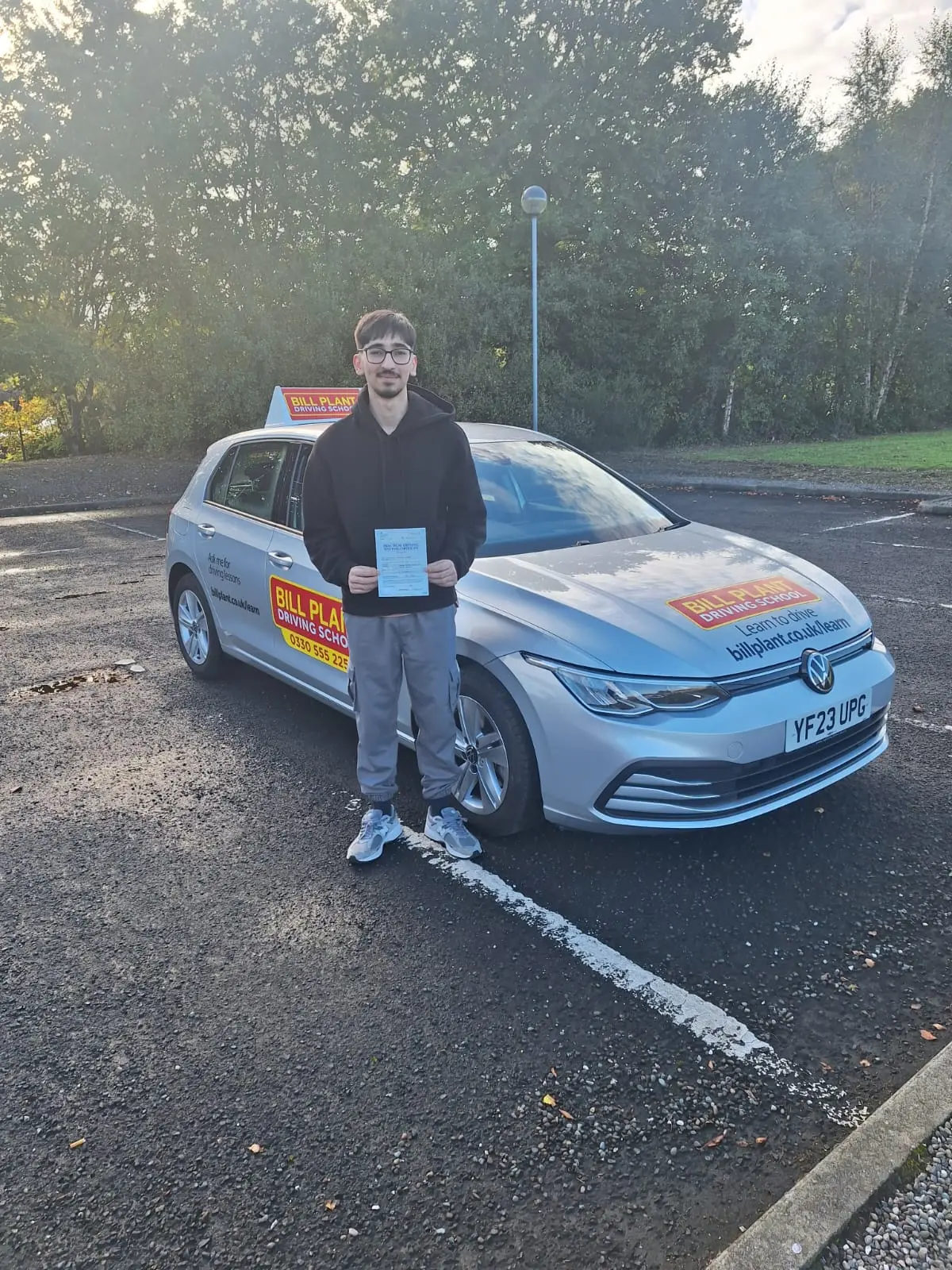 Student taking driving lesson